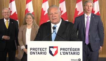 Premier Doug Ford announces free trade legislation at Queens Park in Toronto, as from left, Economic Development Minister Vic Fedeli, New Brunswick Premier Susan Holt, and Nova Scotia Premier Tim Houston listen, April 16, 2025. Screenshot courtesy Premier of Ontario/YouTube.