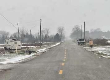 A camping trailer takes out a hydro pole on Rokeby Line - Dec. 7/24 (Photo courtesy of Lambton OPP)