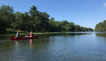 A canoe on the water. (File photo by Melanie Irwin, Blackburn News)