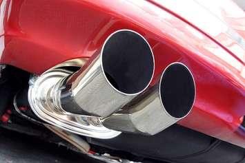 A dual exhaust muffler. File photo courtesy of © Can Stock Photo / Pixelia29