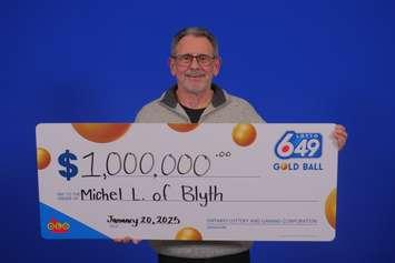 Michel Lacroix of Blyth can “find his possible” after winning a LOTTO 6/49 prize worth $1 million in the Gold Ball Draw on December 21, 2024. Photo from OLG