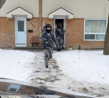 Police executing a search warrant on Kathleen Ave (Image courtesy of the Sarnia Police Service)