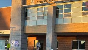A memorial is laid at the front of Walkerton District Community School after a tragic collision. Photo by JC Coutts