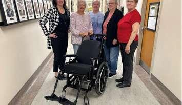 Pictured from left to right: Dana Howes (President & CEO of Hanover and District Hospital), Jeannette Wilken (Auxiliary President), Linda Alcock (Auxiliary Secretary), Eileen Skinn (Auxiliary 2nd Vice President), and Joyce Wedow (Auxiliary Gift Shop Convener with one of the newly acquired tilt wheelchairs. Photo from Hanover Hospital.