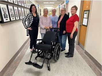 Pictured from left to right: Dana Howes (President & CEO of Hanover and District Hospital), Jeannette Wilken (Auxiliary President), Linda Alcock (Auxiliary Secretary), Eileen Skinn (Auxiliary 2nd Vice President), and Joyce Wedow (Auxiliary Gift Shop Convener with one of the newly acquired tilt wheelchairs. Photo from Hanover Hospital.