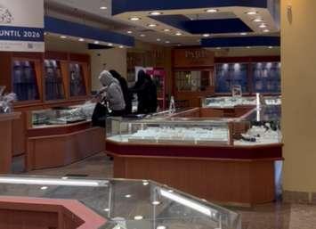 Four people smashing display cases during a robbery at Paris Jewellers at the Stratford Mall, June 22, 2025. Photo provided by the Stratford Police Service