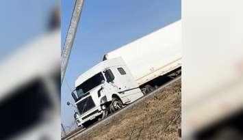 The scene after a transport truck slid into the median of the Hwy. 401 near Bloomfield Road, Chatham. March 12, 2019. (Photo by Natasha Willboughby)